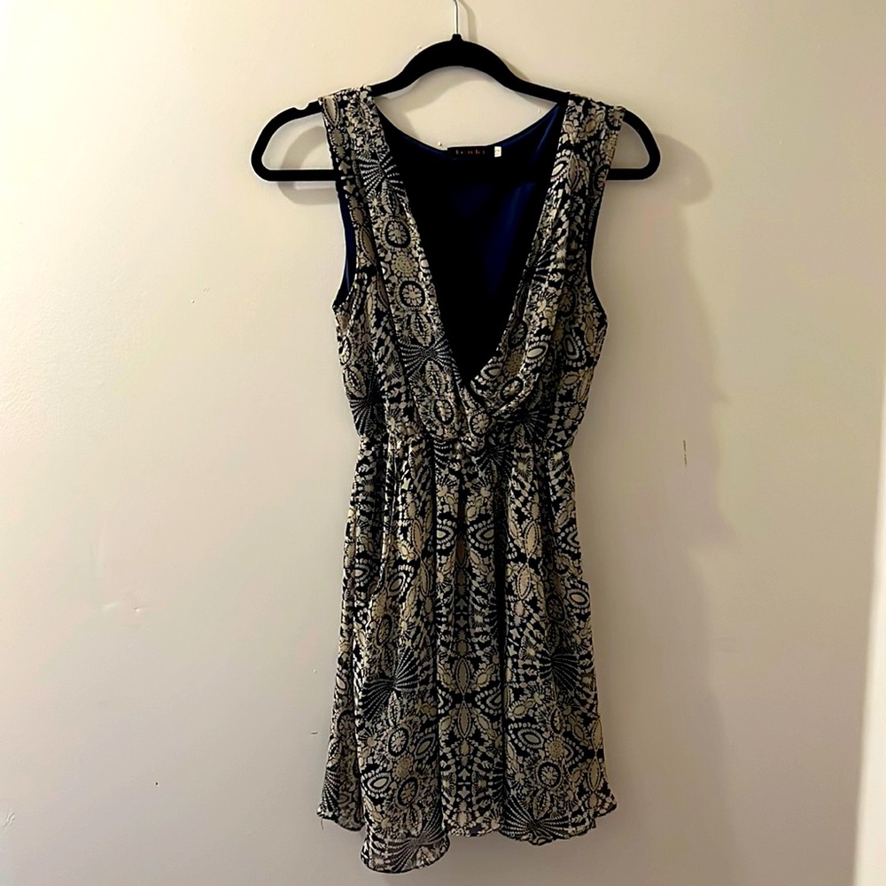 Beautiful low V Flowy Mini Dress